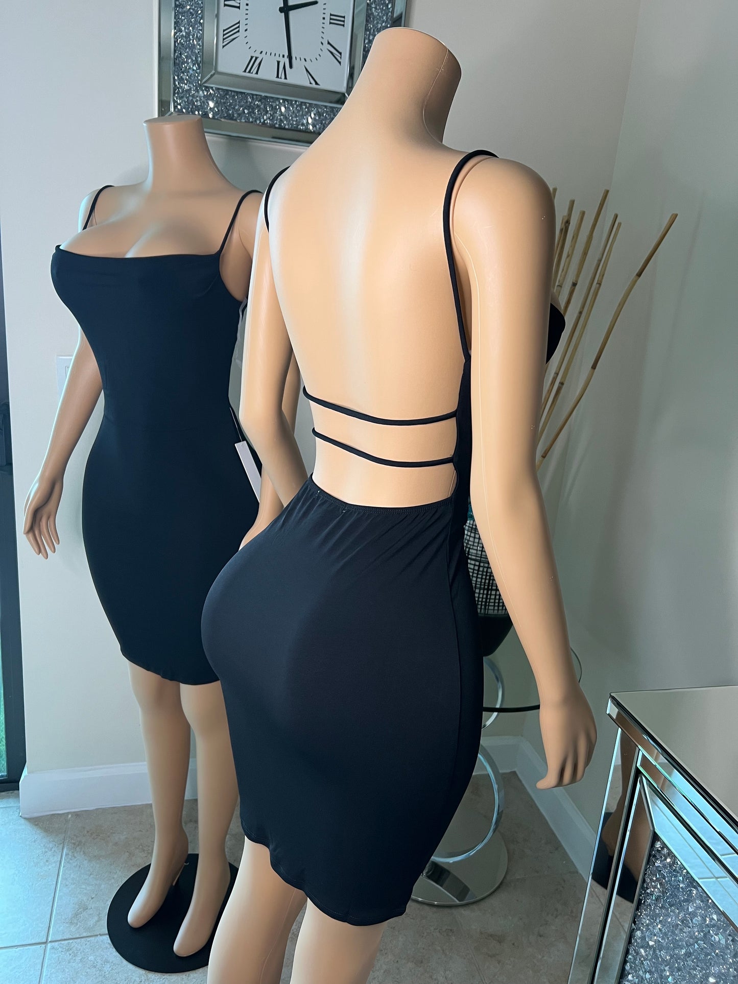 backless black mini dress